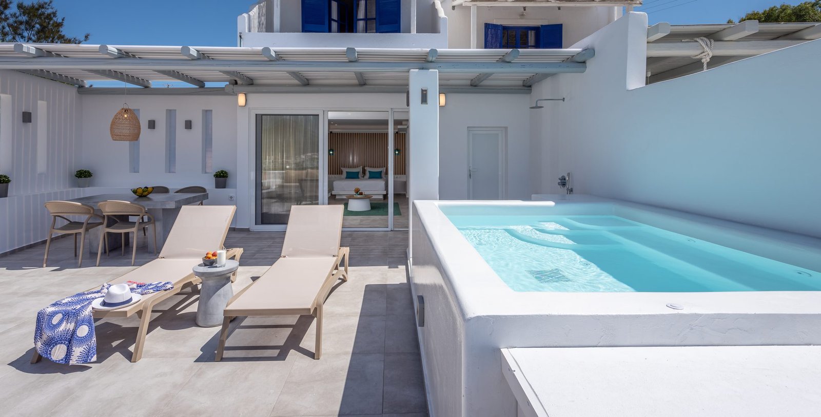 The terrace and pergola above the bay of Adamas
