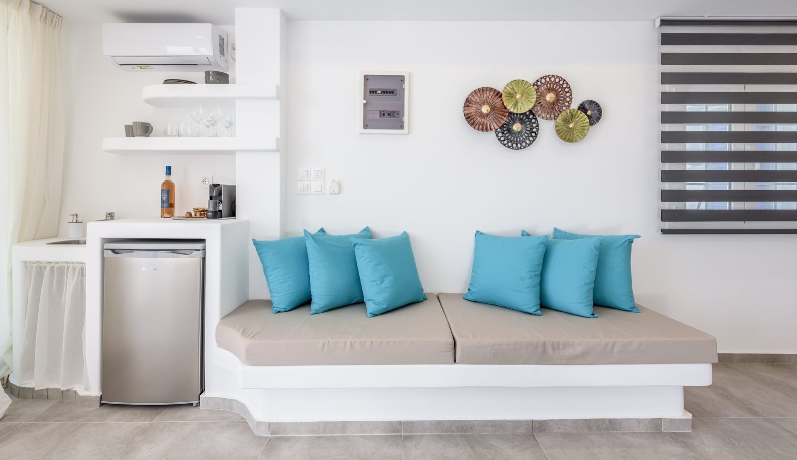 The kitchenette with Nespresso machine and fridge